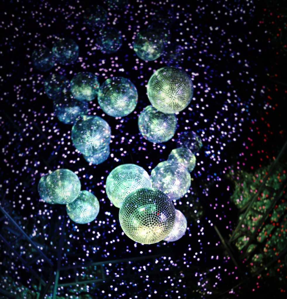 NYC nightlife illuminated disco balls in a club Birthday Bottle Service